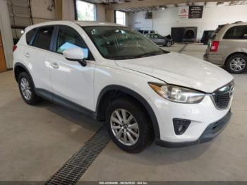  Salvage Mazda Cx