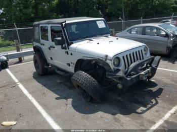 Salvage Jeep Wrangler